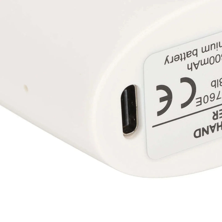 close-up of PowerGrip hand grip strengthener USB charging port and battery label